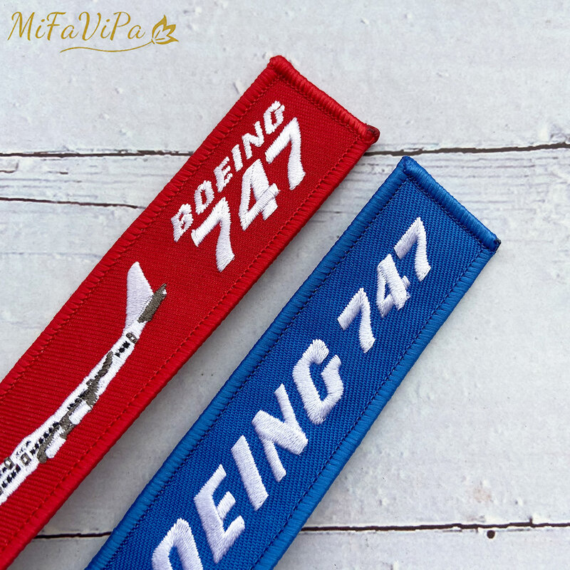 2 قطعة الأحمر والأزرق التطريز بوينغ 747 موضة حلية المفاتيح شريط لتعليق الهاتف المحمول الطيران مفتاح سلسلة للرجال هدية الأمتعة علامة Keyrin
