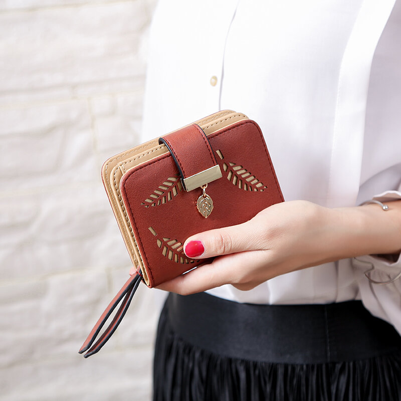 ファッションの女性の財布ショート財布中空休暇ポーチハンドバッグ女性のためのコインpuレザー財布カードホルダーcarteira
