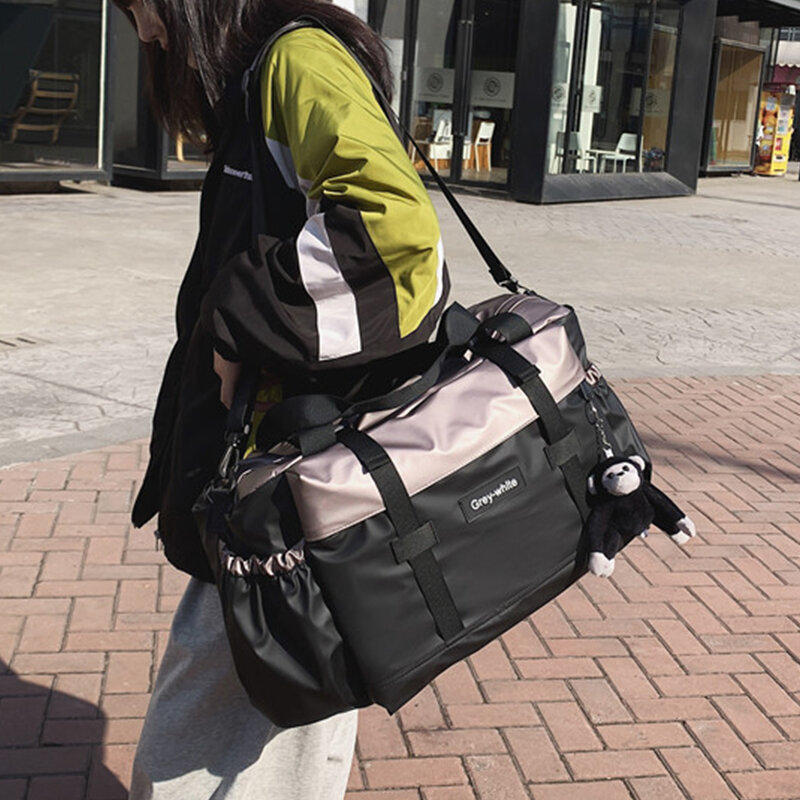 سعة كبيرة الرياضة حقيبة تسوق سفر للجنسين مصمم الأسود اللياقة البدنية حقائب السفر الرجال موضة بسيطة حقيبة ساعي عادية المرأة 2021