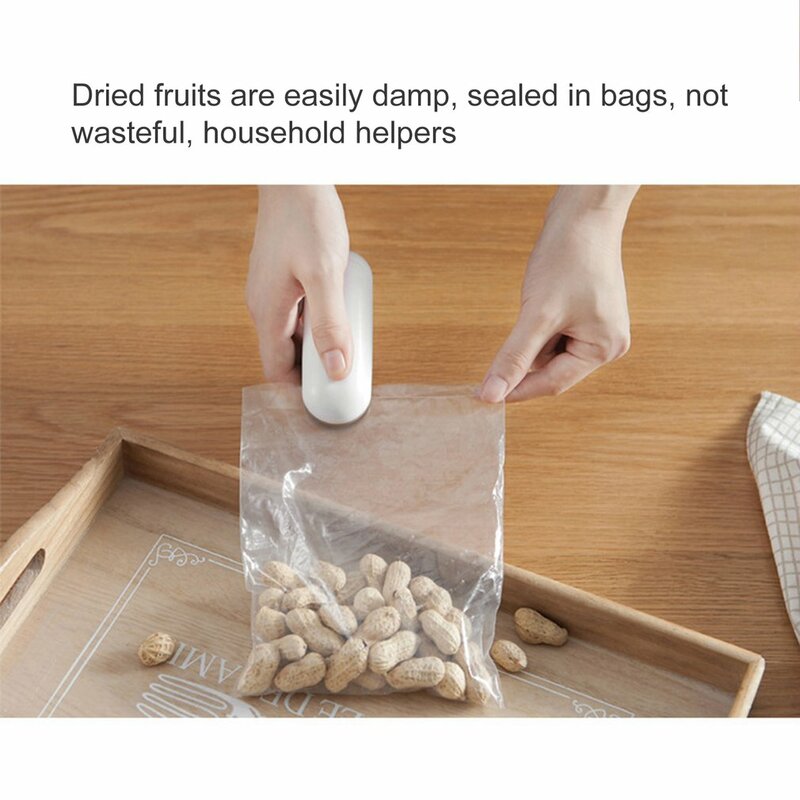 휴대용 미니 가방 열 밀봉 기계 캐퍼 캡슐 스낵 식품 플라스틱 소형 가정용 손 압력 열 밀봉