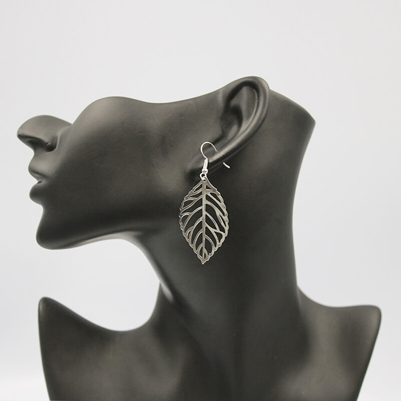 Boucles d'oreilles pendantes en forme de feuilles de métal pour femme, Bijoux creux à la mode, nouvelle collection, vente en gros