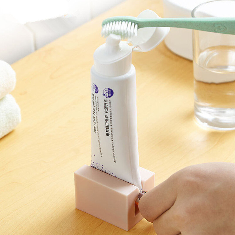 1pc 4 cores casa de plástico creme dental tubo squeezer fácil dispenser titular do rolamento do banheiro fornecimento acessórios limpeza dente