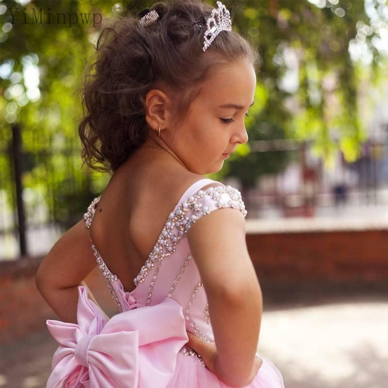 ลูกบอลสีชมพูชุดดอกไม้ชุดสาวสปาเก็ตตี้สายรัดความยาวลูกปัดใหญ่โบว์โบว์เด็กวันเกิด Party Gowns