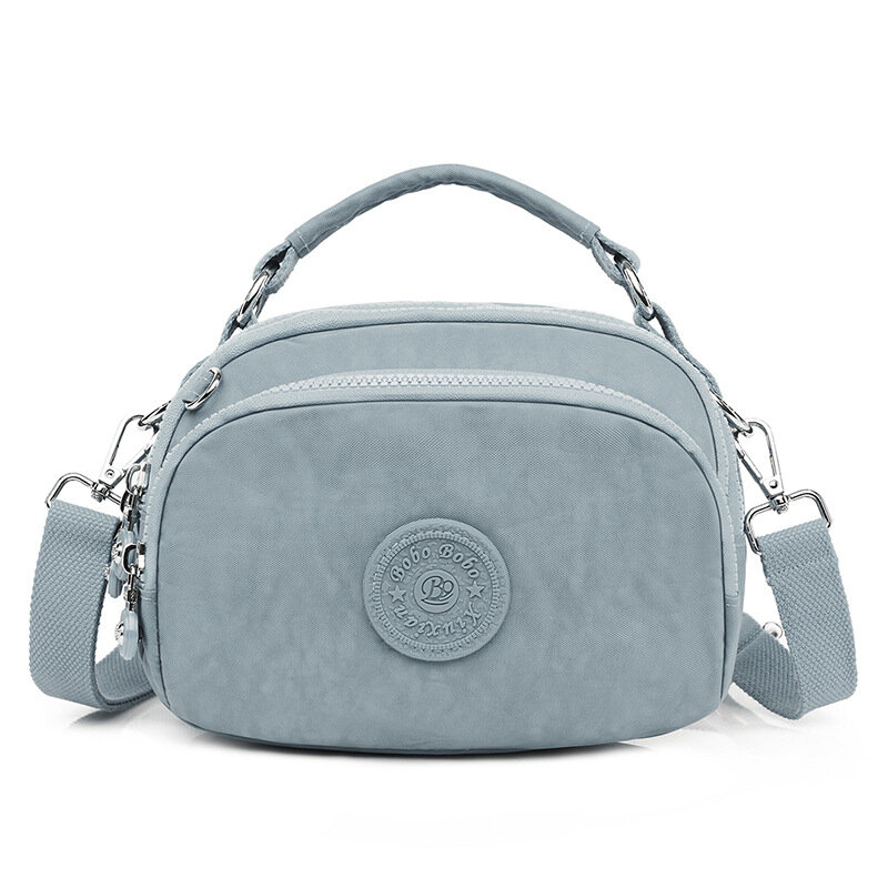 Nuova borsa a tracolla da donna moda colore puro Casual Tote borsa da esterno borsa di tela cerniera Messenger Crossbody alta qualità