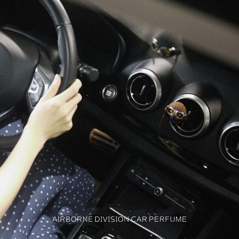 Luksusowy samochód rozpylacz zapachów kreatywny dywizja powietrzna odświeżacz powietrza do samochodu prawdziwy skórzany pasek wiszący odświeżacz do samochodu