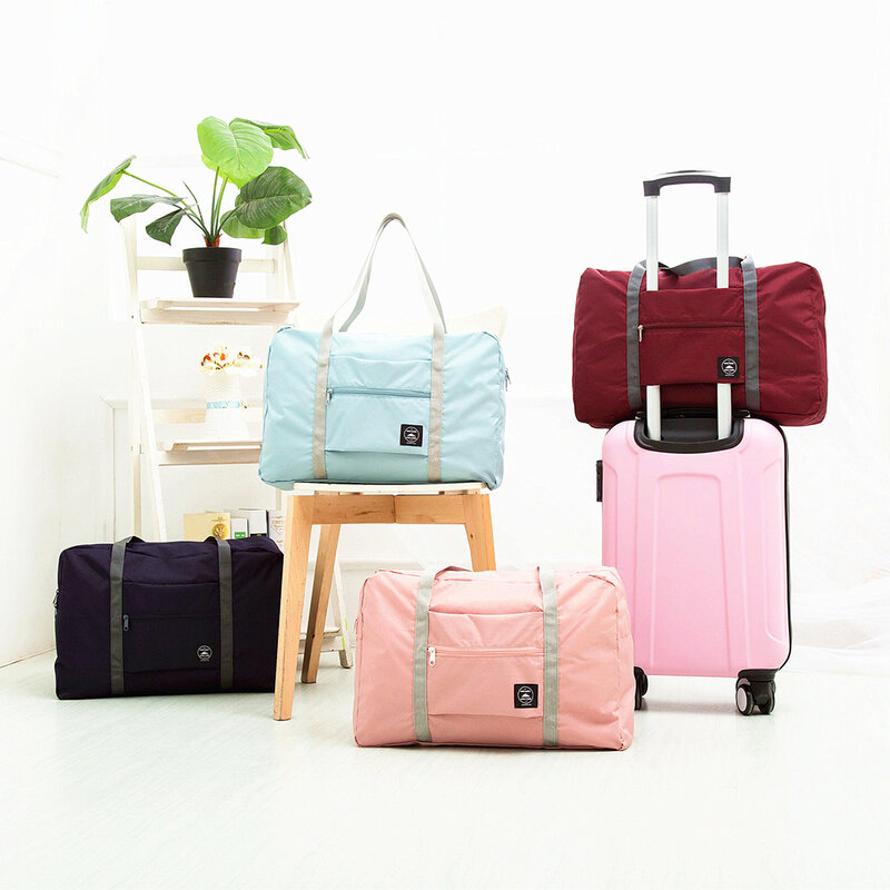 جديد النايلون حقيبة سفر قابلة للطي 2021 للجنسين سعة كبيرة حقيبة الأمتعة النساء حقائب مقاوم للماء الرجال حقائب السفر