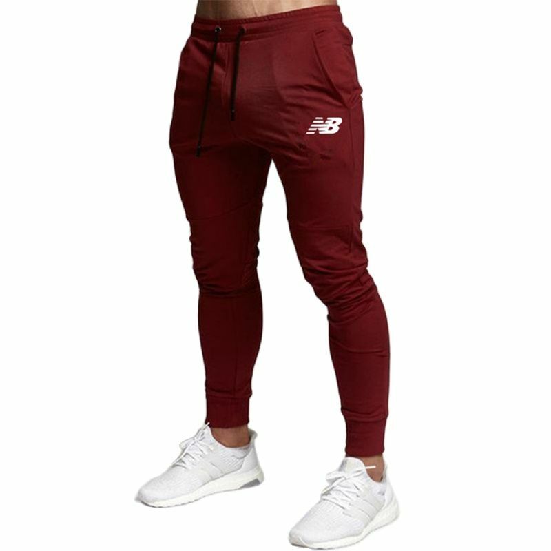 2021 calças de jogging dos homens da marca calças esportivas calças de jogging dos homens calças esportivas primavera e no outono qualidade de fitness calças masculinas casuais