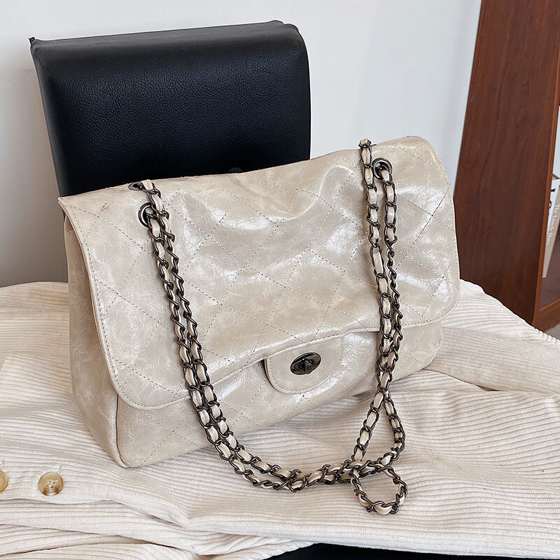 2021 شتاء جديد ريترو كبير بولي leather جلد السيدات حقيبة كتف سلسلة معدنية رائعة حقيبة ساعي السفر حقيبة يد ذات سعة كبيرة