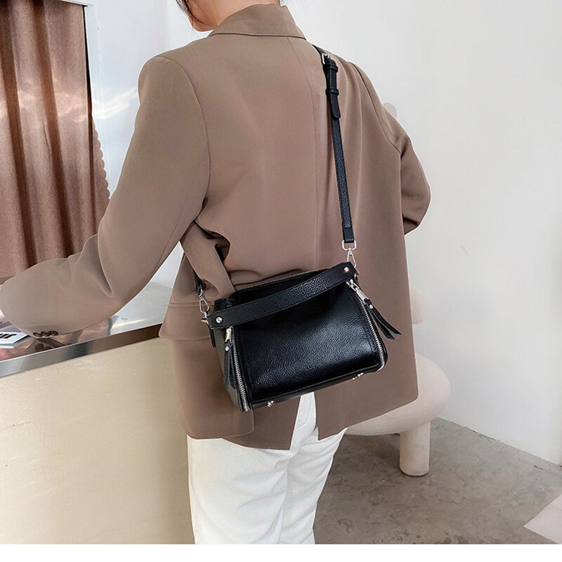 Nowa torebka z prawdziwej skóry dla kobiety proste Pure Color miękkie torby na ramię Retro elegancka luźna torba na długim pasku Designer Bolsa