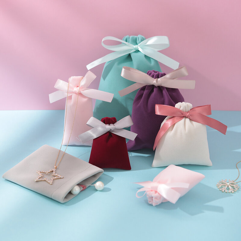 50 sztuk 7cm x 9cm biżuteria aksamitne torby ze wstążką flanelowe torebki ślubne cukierki pakowanie prezentów na boże narodzenie dekoracji może własne Logo