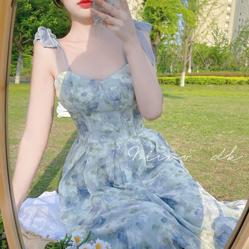 فستان جنية جديد الصيف الفرنسية خمر أنيقة السباغيتي حزام الأزهار طباعة فستان حفلة قطعة واحدة المرأة الكورية فستان أنيق
