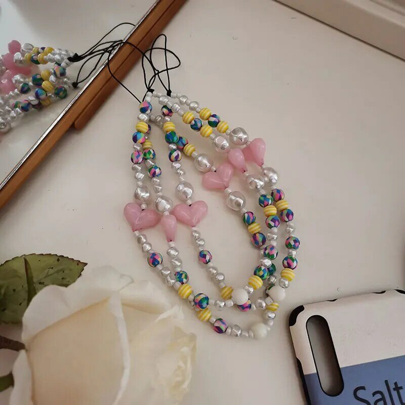 Nuevo coreano ídolo de perlas de moda teléfono Correa perla Irregular bolas de colores corazón Rosa cordón para el móvil para la caja del teléfono HangZhi 2021
