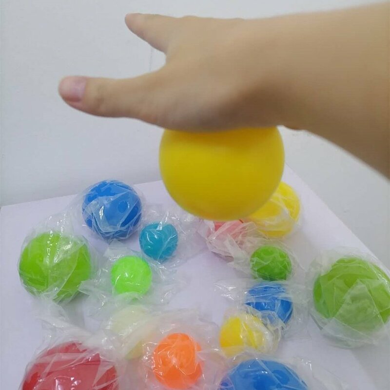 Bola de pared pegajosa de 1 pieza, Bola de succión de pared de descompresión de juguete, bola de objetivo pegajosa fluorescente, Bola de ventilación de Color aleatorio