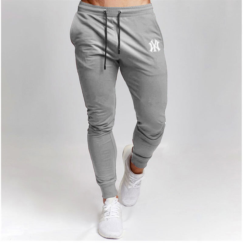 Dorywczo spodnie męskie spodnie dresowe dla joggerów duże rozmiary w pasie sportowe spodnie typu Casual luźna odzież Fitness wiosna cienka sekcja