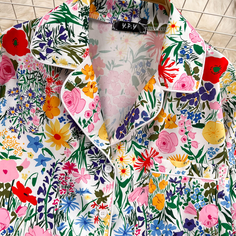 Camisa Floral de una sola botonadura de longitud media con temperamento Retro, pantalones de pierna ancha de cintura alta informales de dos piezas
