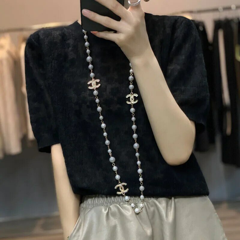 2022 Summer New Women's Sweater Pullover Short-Sleeved Hook Flower Hollow Slightly Transparent Loose Jacquard French Wool Sweate