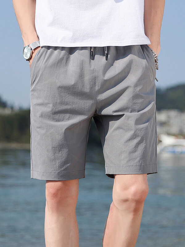 Pantalones cortos de chándal de nailon para hombre, ropa deportiva con bolsillos y cremallera, informal, talla grande, 8XL, 2022