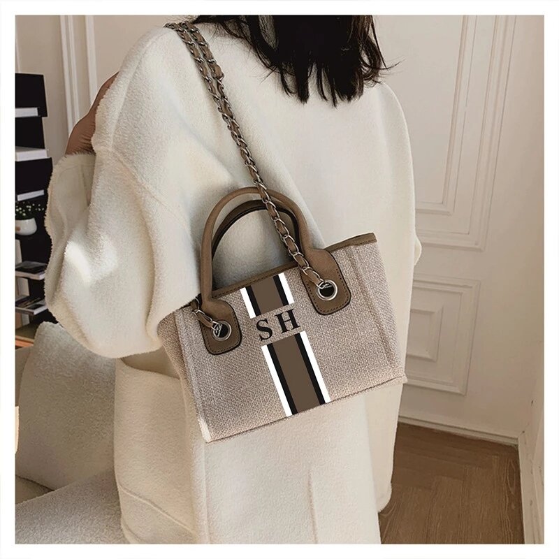 C Xiang C-Bolso de lona de gran capacidad para mujer, bolsa de hombro con cadena, informal, a la moda