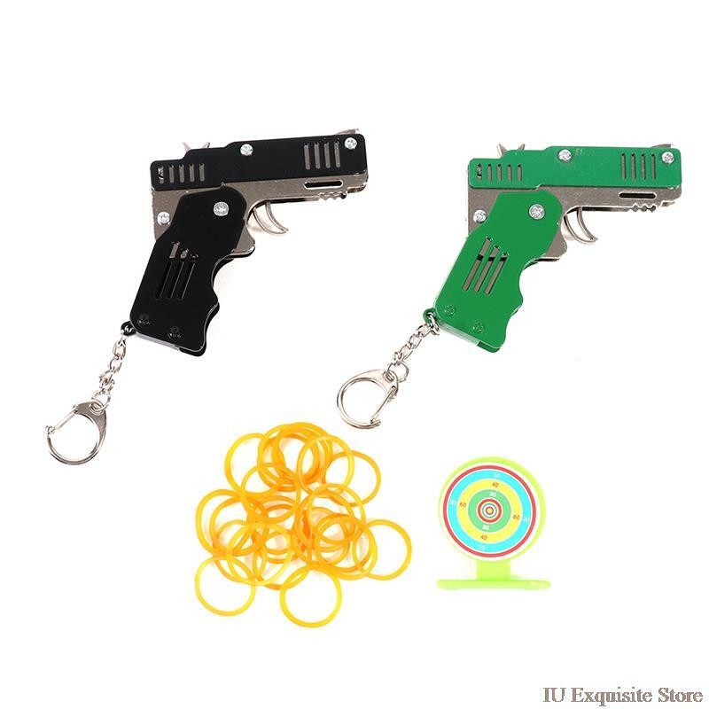 1 conjunto de metal cheio borracha banda arma modelo brinquedo pistola dobrável seis explosão arma brinquedo escola elementar presente animação jogo chave anel