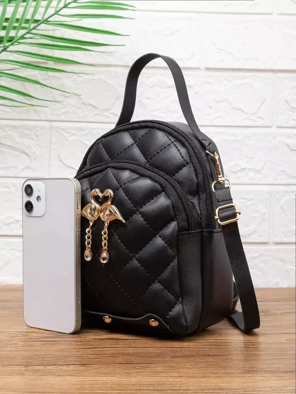 Mini Quilted Curved Top Backpack