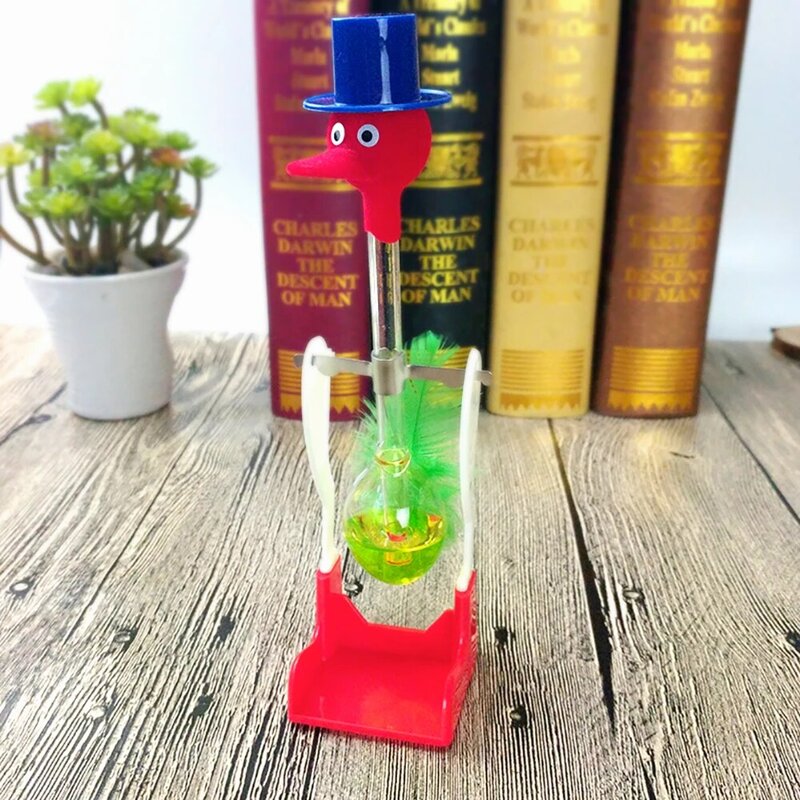 Creative Non-Stop Liquid Drinking Glass Lucky Bird Duck Bobbing Magic Prank Toy