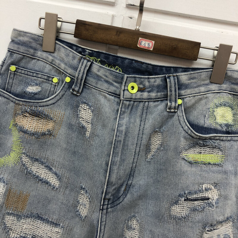 Pantalones vaqueros desgastados con agujeros para hombre y mujer, ropa de calle de la mejor calidad, negro, verde, fluorescente, bordado de letras