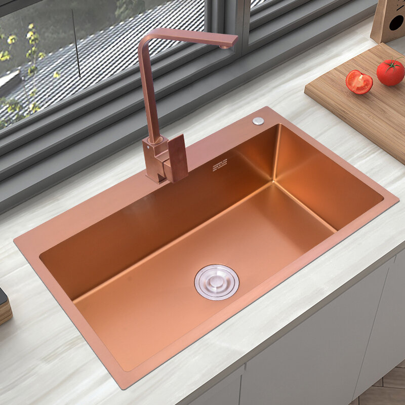 Il rubinetto dell'acqua calda e fredda della cucina in oro rosa può essere ruotato solo rubinetto