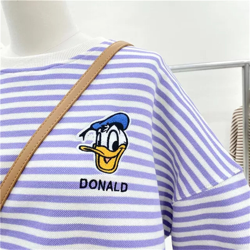 女性と男性のためのシックな刺繍入りドナルドダックストライプのスウェットシャツ,ゆったりとしたストリートウェア,韓国のファッションセーター