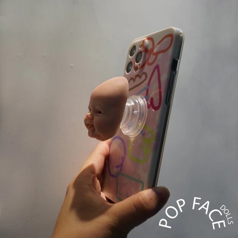 "PopFaces" PopGrip mit mini Reborn Baby puppe Gesicht Top ”Lächeln tägliche“ für Handys HOT Anti-stress Spielzeug geschenk für newyear