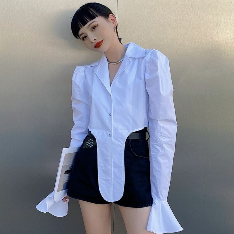 2022 early autumn new long-sleeved super-long pointed collar back single-breasted shirt blue fashion trend shirt women