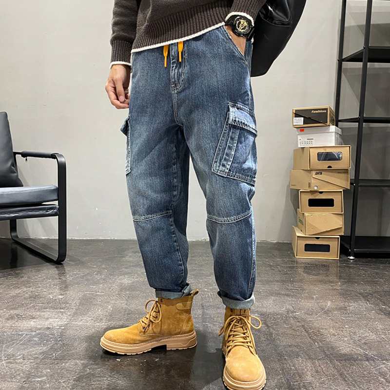Streetwear mężczyźni nowy wzór niebieskie spodnie Mop moda Hip Hop z wieloma kieszeniami luźne kombinezony Temperament uniwersalne dżinsy jesień