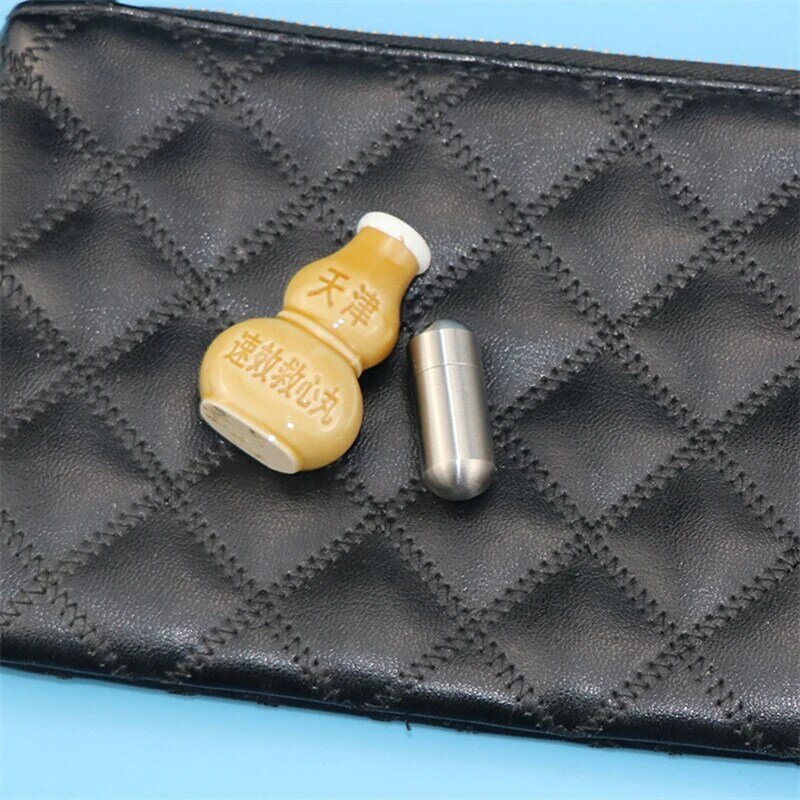 ผู้ถือ Pill กันน้ำโลหะแคปซูลกล่องยามินิ Keychain กล่องเก็บยาจี้