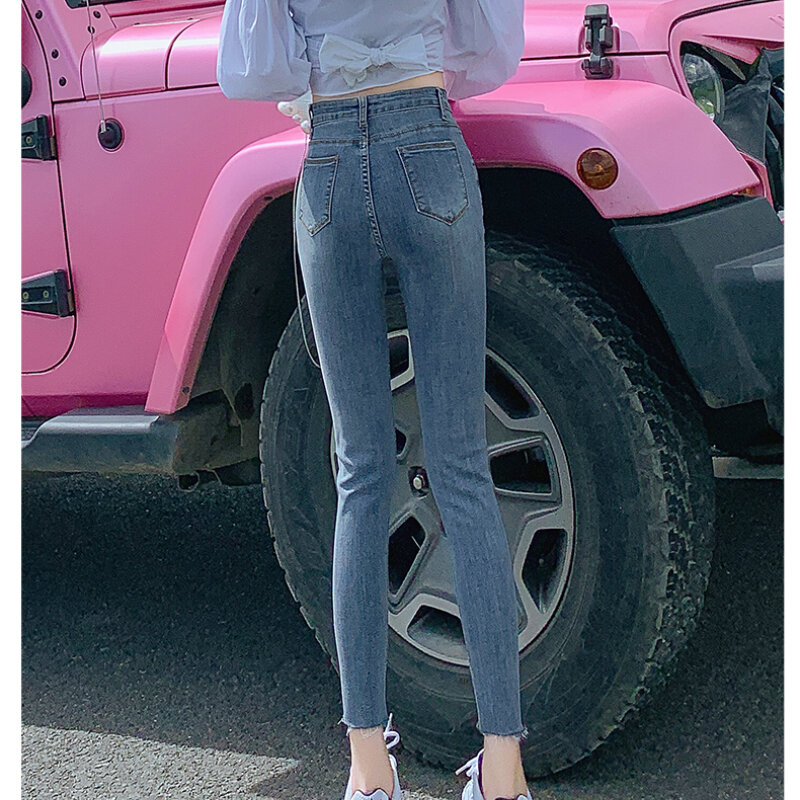 ربيع جديد ممزق جينز المرأة عالية الخصر تصميم المتخصصة سليم التخسيس ضيق قدم سروال شكل قلم رصاص الاتجاه زر سروال شكل قلم رصاص الجينز