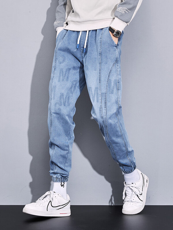 Plus Size blu nero Jeans larghi uomo Hip Hop Streetwear pantaloni Jogger uomo Jeans pantaloni larghi Harem Jean elasticizzati 8XL