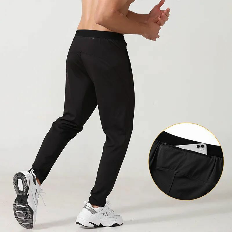 Celana Olahraga Besar Celana Jogger Pria Pas Badan Warna Solid Sejuk Elastis Panjang Pergelangan Kaki Celana Olahraga Kasual Mendaki Berkemah
