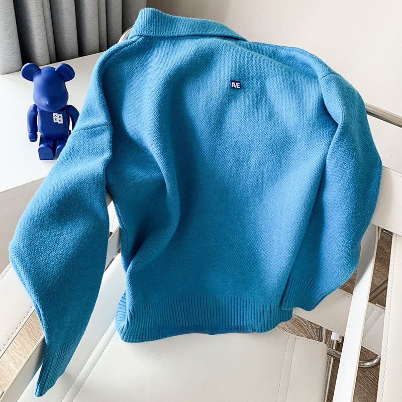 Suéteres de punto de lana para hombre y mujer, jerseys con botón de solapa tipo Polo, 1:1
