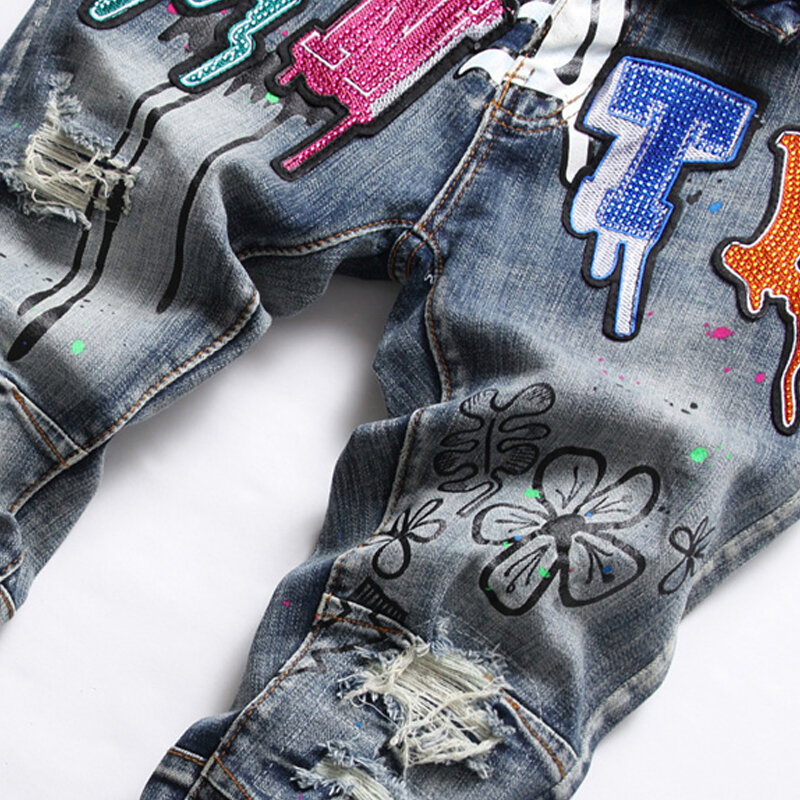 Jean Homme Jeans mężczyźni drukowanie Streetwear zgrywanie spodnie dżinsowe popularnej marki spodnie dorywczo stałe Biker zniszczony otwór Slim Fit przytulne