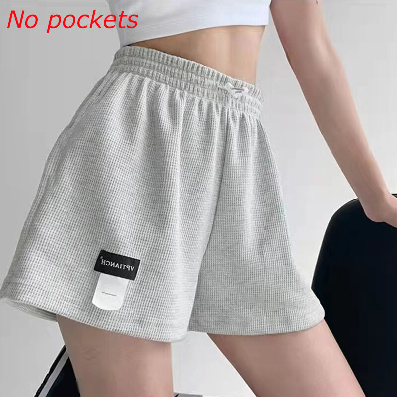 Calções de waffle feminino calças quentes calções de desporto bottoms homewear cor sólida bolsos elásticos casuais cintura alta feminina solta curto