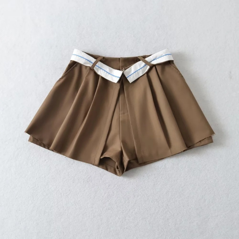 Plisowane spodnie damskie fałszywe dwuczęściowe krótkie spódniczki seksowne kolory o nieregularnym kontraście w talii gorące dziewczęce spodnie nieprześwitująca