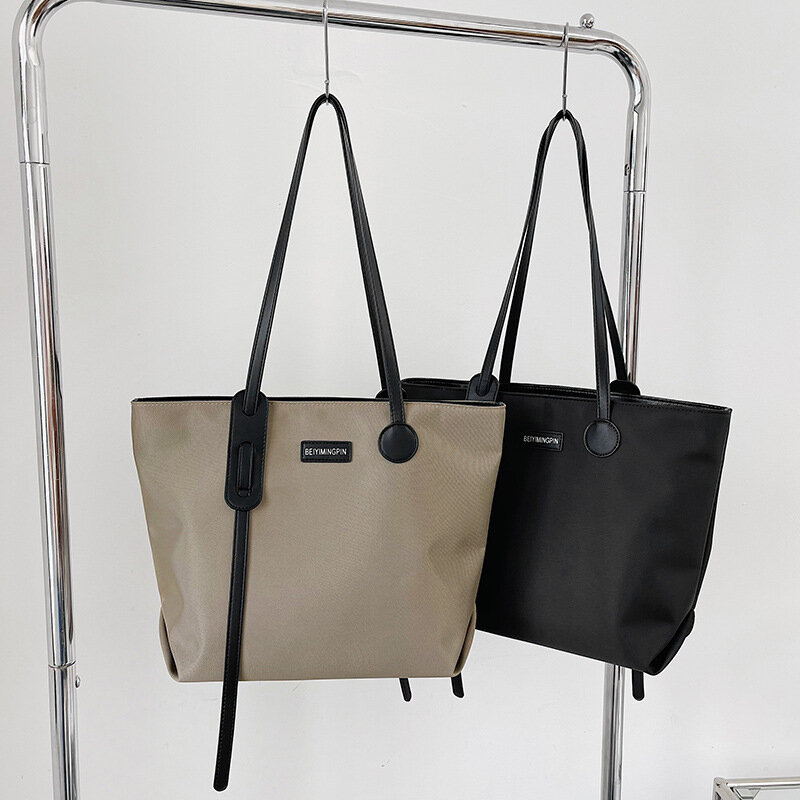 2022 nuova borsa da pendolare in tessuto di Nylon impermeabile borsa da pendolare da donna autunno borsa grande a una spalla portatile di grande capacità