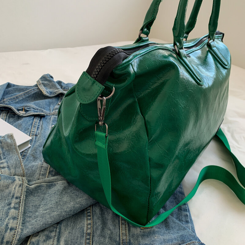 يليان حقيبة سفر 2022 جديد المرأة الملابس حمل حقيبة للسفر حمل خفيفة و سعة كبيرة بولي PU حقيبة الأمتعة
