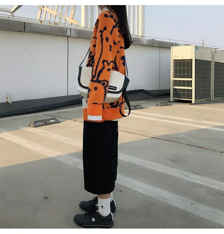 Maglione allentato Casual simpatico cartone animato Pullover lavorato a maglia arancione a maniche lunghe Vintage Harajuku moda invernale da donna