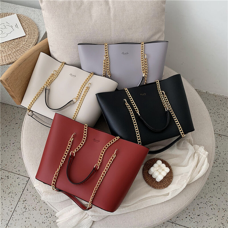 Bolso de mano de gran capacidad con diseño de cadena para mujer, bolsa de hombro de cuero PU de Color sólido, a la moda, urbano, sencillo, para axilas, 2022