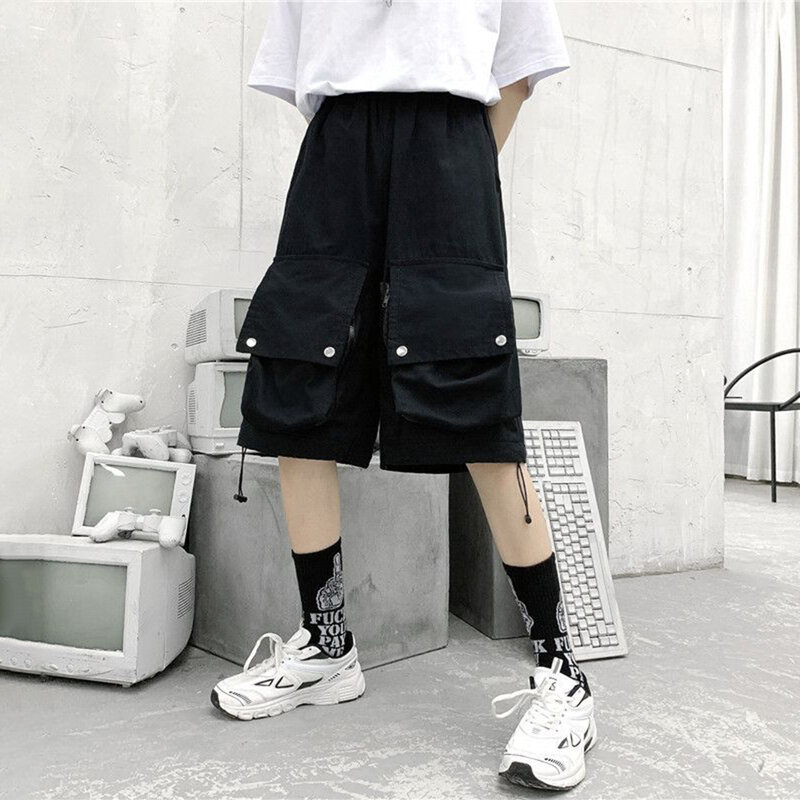 Pantaloni da tuta a due pezzi staccabili alla moda da strada pantaloni sportivi Casual dritti larghi pantaloncini a gamba larga con Design tascabile da uomo