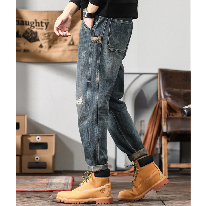 Streetwear mężczyźni wzór dziura dżinsy z łatkami luźne rekreacyjne prosto Cylinder niebieski Temperament spodnie jesień kobiet 2022 nowy