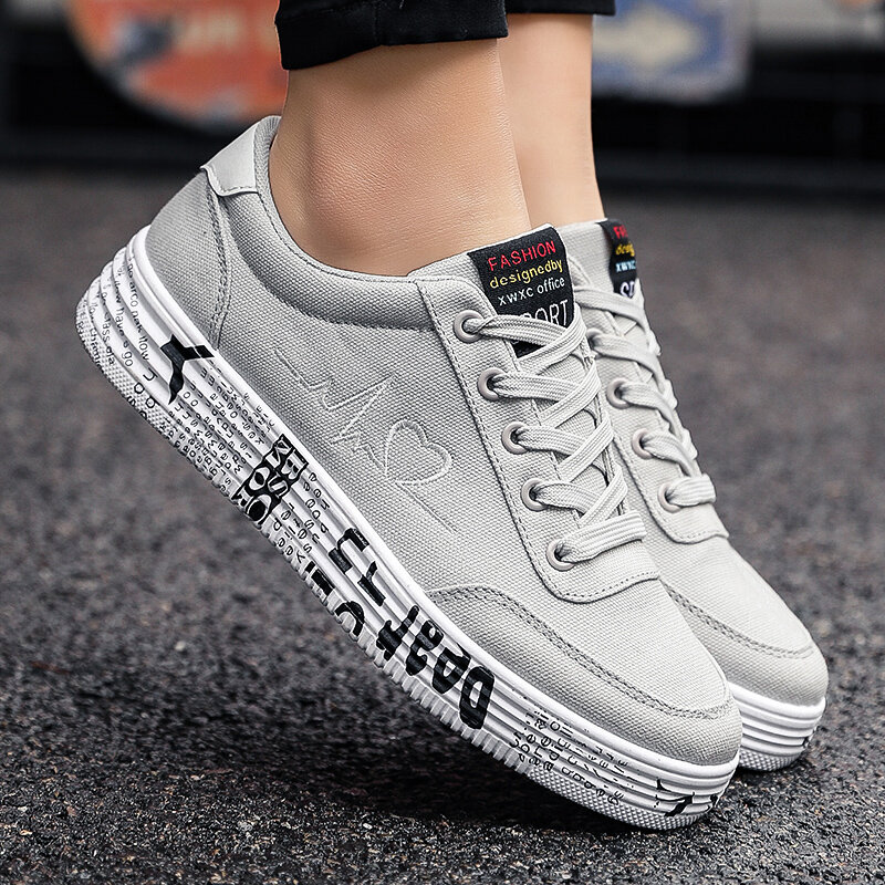 Couple Shoes 2022 New Fashion Women Vulcanized Shoes Ladies Lace-up Casual Sneakers Breathable Canvas Graffiti Flat Plus Siz 44