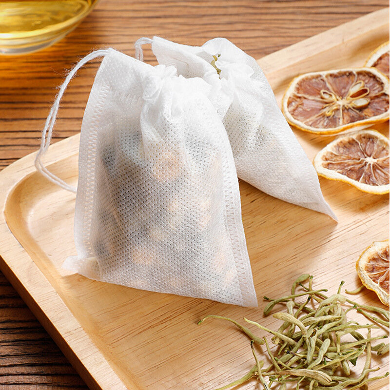 100 sztuk torebki jednorazowe torebki herbaty woreczki filtracyjne z String Heal Seal włókniny Spice filtry torebki na Herb Loose Tea