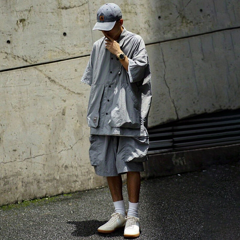 Hip-hop giapponese Bboy Skateboard abbigliamento alpinismo sciolto Outdoor Multi-tasca tuta pantaloni a maniche corte Set di due pezzi