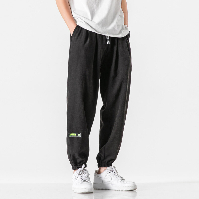 Spodnie męskie wiosenne i letnie nowe koreańskie modne spodnie typu Casual sportowe spodnie dresowe spodnie do joggingu męskie hip-hopowe haremowe Streetwear
