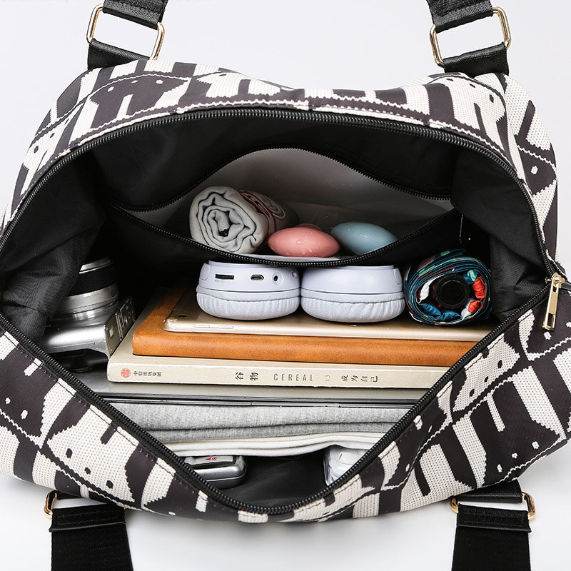 YILIAN borsa da viaggio in tela di grande capacità per le donne 2023 borsa a tracolla portatile di nuova moda popolare borsa Tote coniglio quest'anno